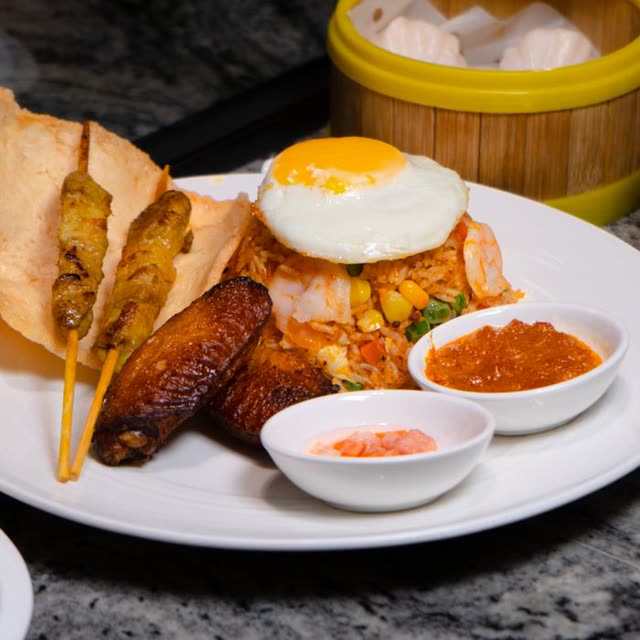 36 · Nasi Goreng: chicken, pork, beef, prawns, vegetables & curry (mildly spicy)