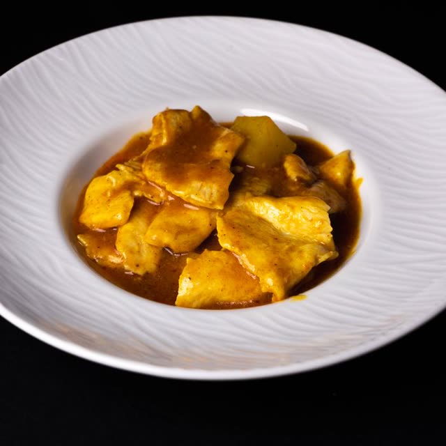 M42 · Chicken breast in curry sauce with rice