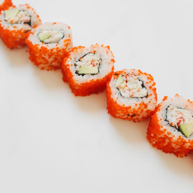 400 · California Inside Out with surimi crab stick, avocado, masago (fish roe), coated in sesame