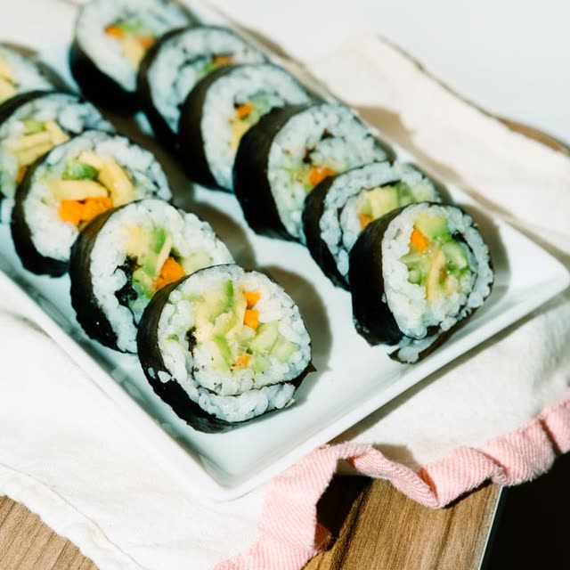 405 · Vegi Inside Out with omelette (tamago), radish, cucumber, coated in sesame