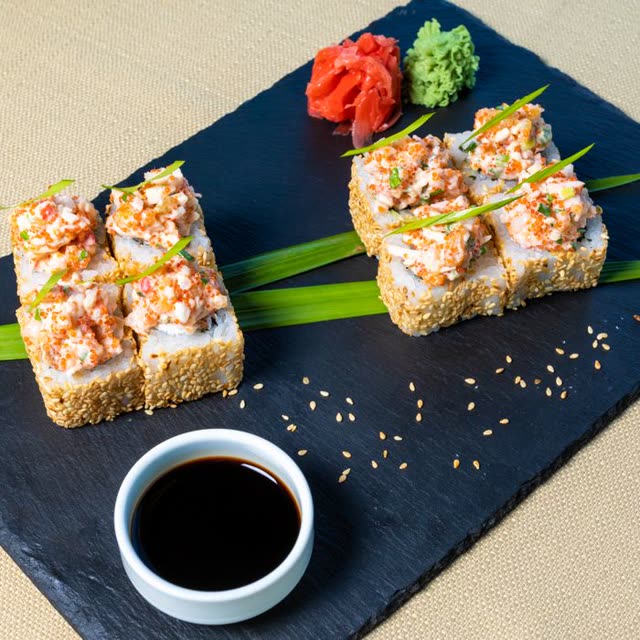 407 · Rainbow Inside Out with surimi crab stick, avocado, coated in sesame