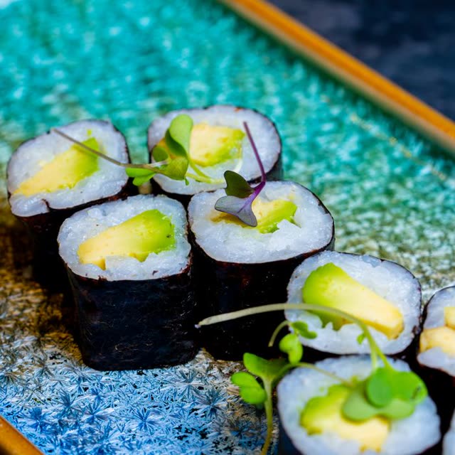 516 · Avo Roll with avocado, cream cheese, coated in sesame