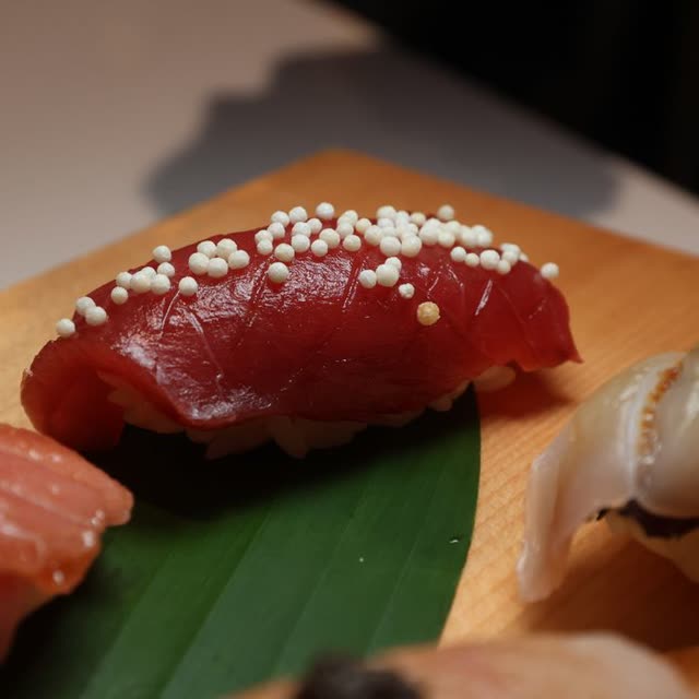 302 · Maguro Nigiri with tuna